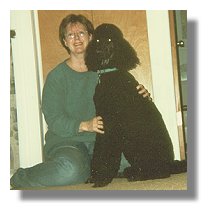 Photo:  Terry and her service dog, Skyler - End of Photo Description